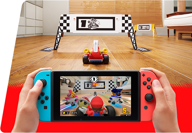 Photo d'une manette de jeu Switch avec le jeu Mario Kart Live